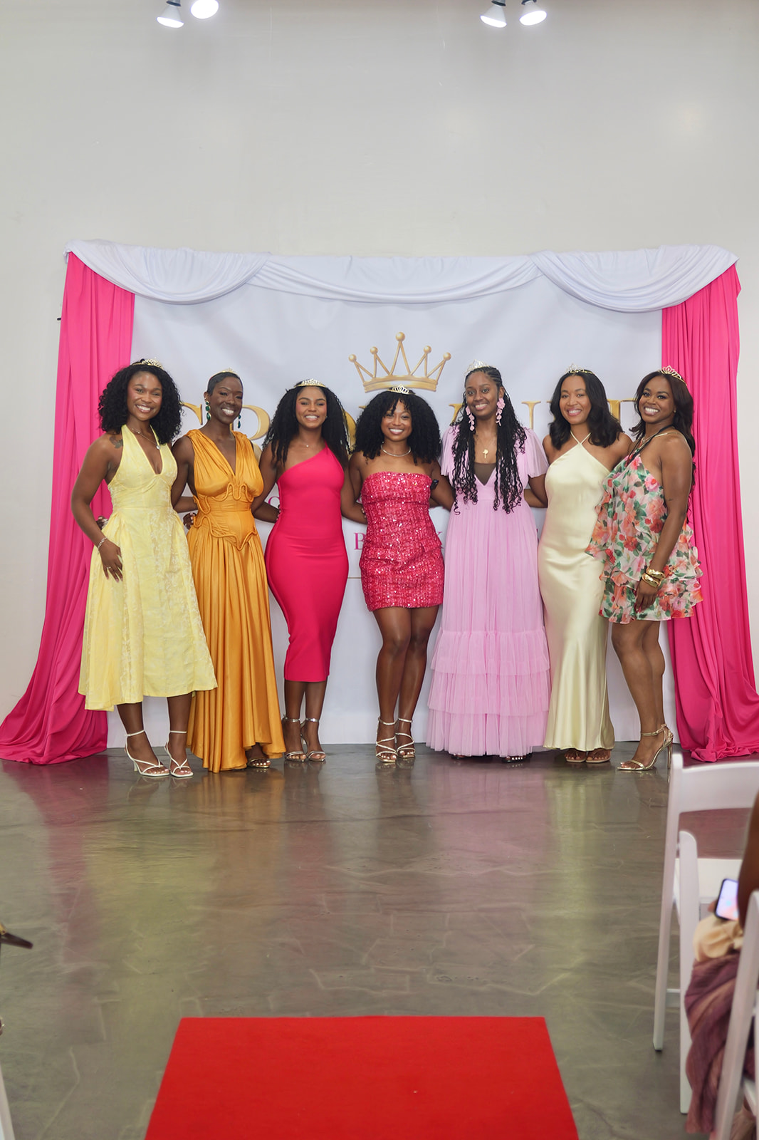 Mothers and mentors standing together in sisterhood.